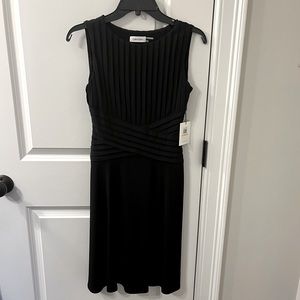 Brand new Calvin Klein Black dress. Size 2